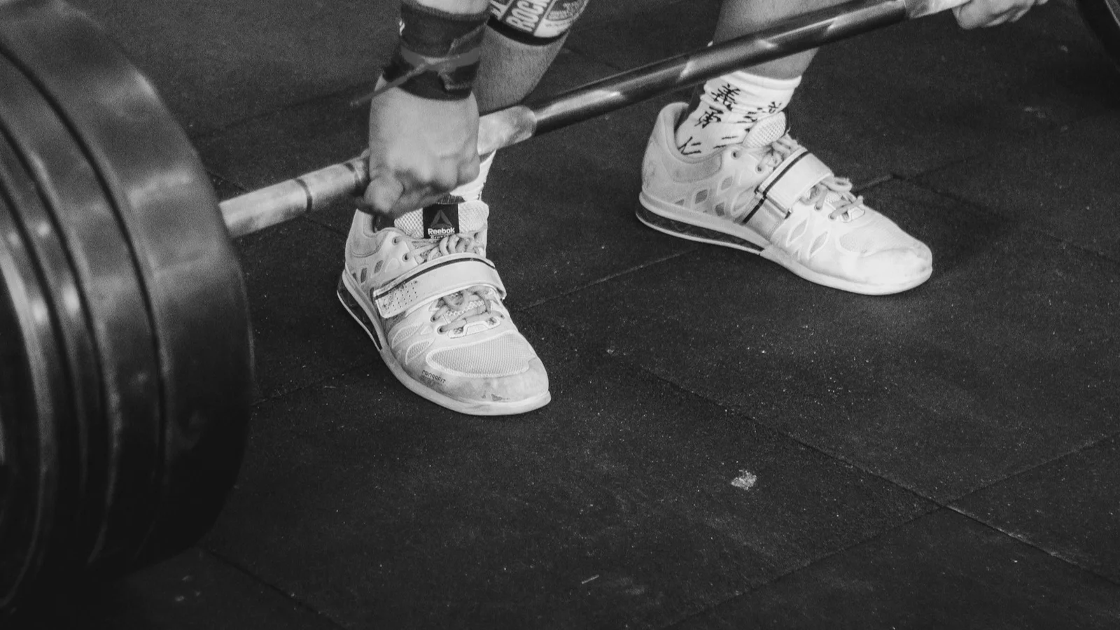 A lifter performing a barbell squat